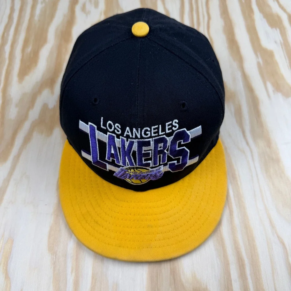 New Era 9FIFTY Los Angeles Lakers Youth Snapback Hat Black Yellow NBA HWC Cap